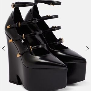 VERSACE
Tempest leather platform pumps
